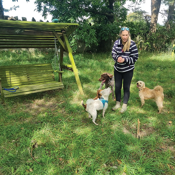 Joanne, Paw Club owner with dogs